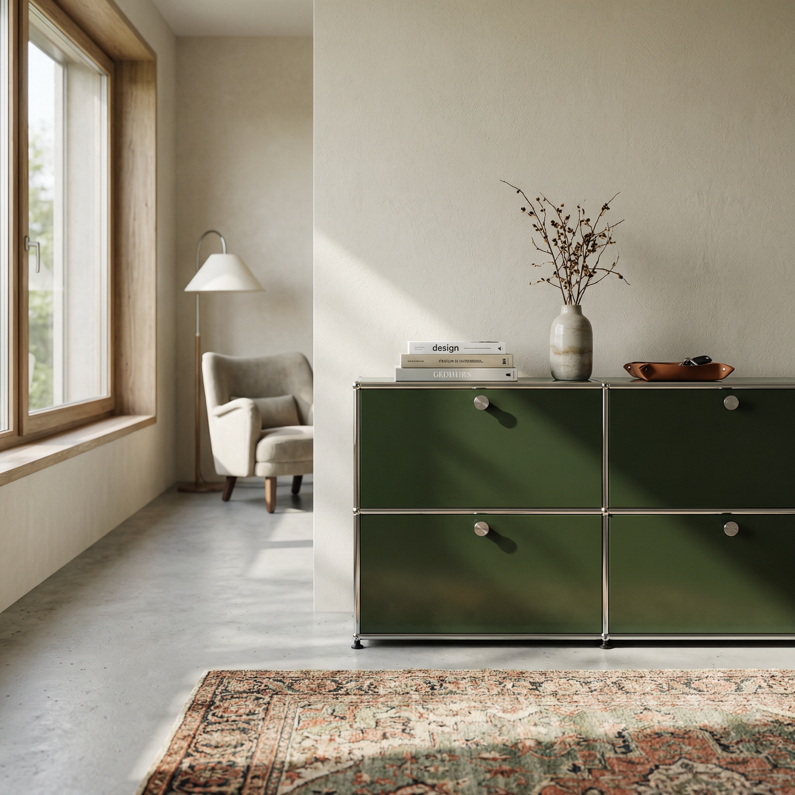 Special USM Haller storage unit in Olive Green styled in a sunlit modern interior with books, vase, and textured rug