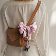 Kay Bojesen Monkey Bag Charm, Teak/Limba, styled view