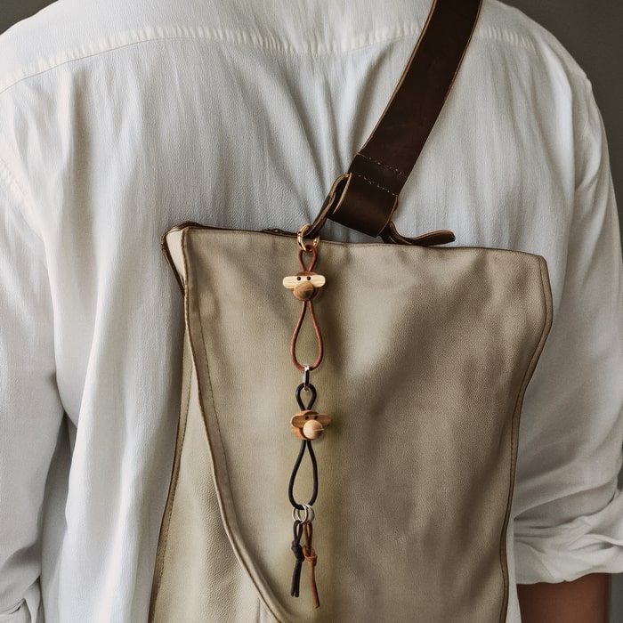 Kay Bojesen Monkey Bag Charm, Teak/Limba, styled view