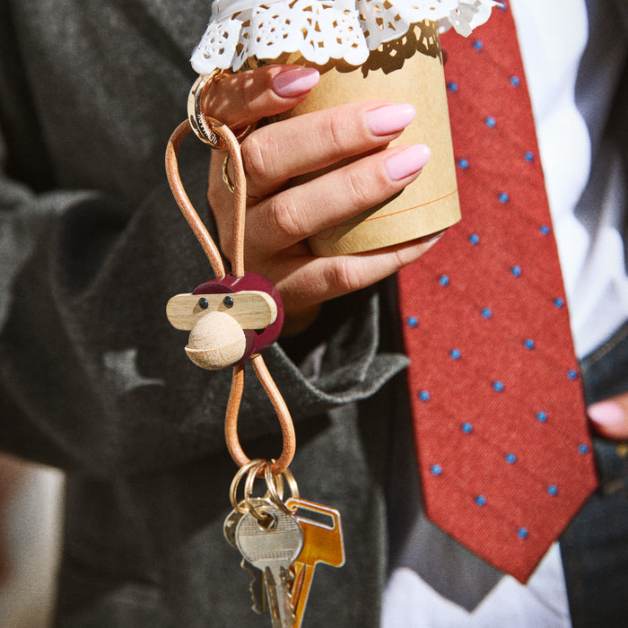 Kay Bojesen Monkey Bag Charm, Painted Oak, styled view