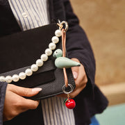 Kay Bojesen Bird Bag Charm, Painted Beech, styled view