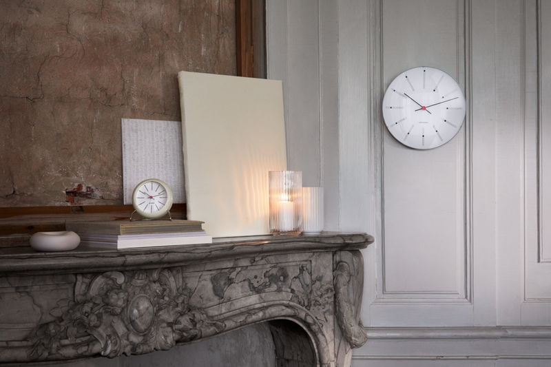 Arne Jacobsen Bankers Table Clock in White in an interior setting
