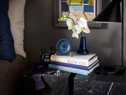 Arne Jacobsen City Hall Table Clock in Stone Blue in an interior setting
