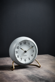 Arne Jacobsen Station Table Clock in Grey and White in an interior setting