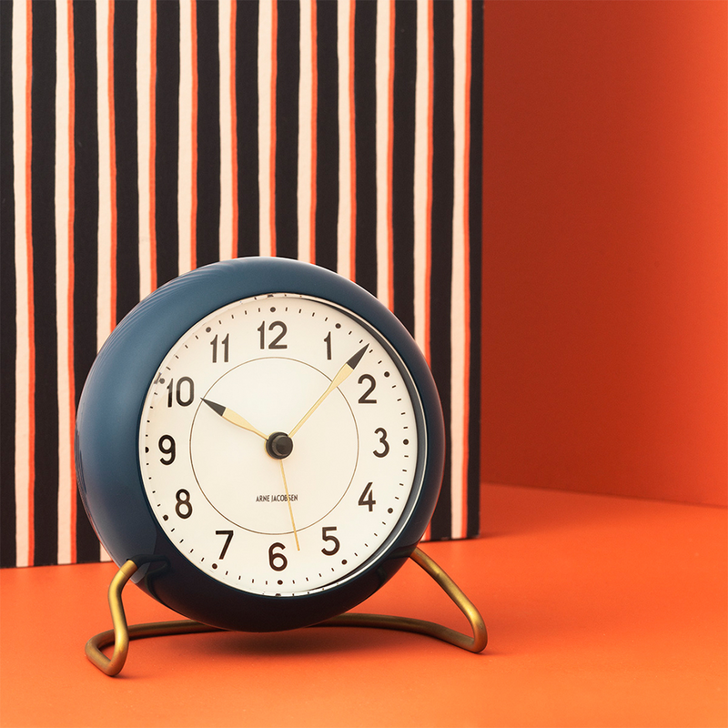 Arne Jacobsen Station Table Clock in Teal and White in an interior setting