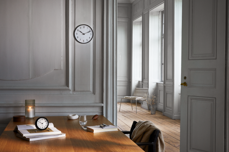 Arne Jacobsen Station Wall Clock in White and Black in an interior setting