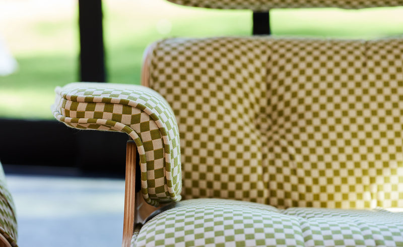 Eames Lounge Chair and Ottoman in Fabric by Herman Miller