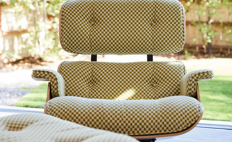 Eames Lounge Chair and Ottoman in Fabric by Herman Miller