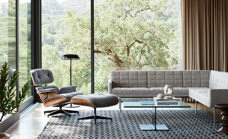 Eames Lounge Chair and Ottoman in Fabric by Herman Miller