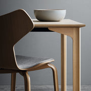 Grand Prix Chair With Wood Legs and Upholstered Front Dining chairs Fritz Hansen 